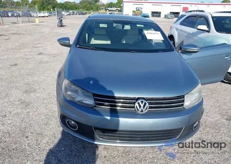 2012 Volkswagen Eos Komfort from USA, damaged, VIN WVWBW7AH5CV003763